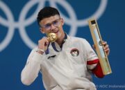 Kejutan di Olimpiade Paris 2024: Rizki Juniansyah Raih Emas dan Pecahkan Rekor Clean and Jerk